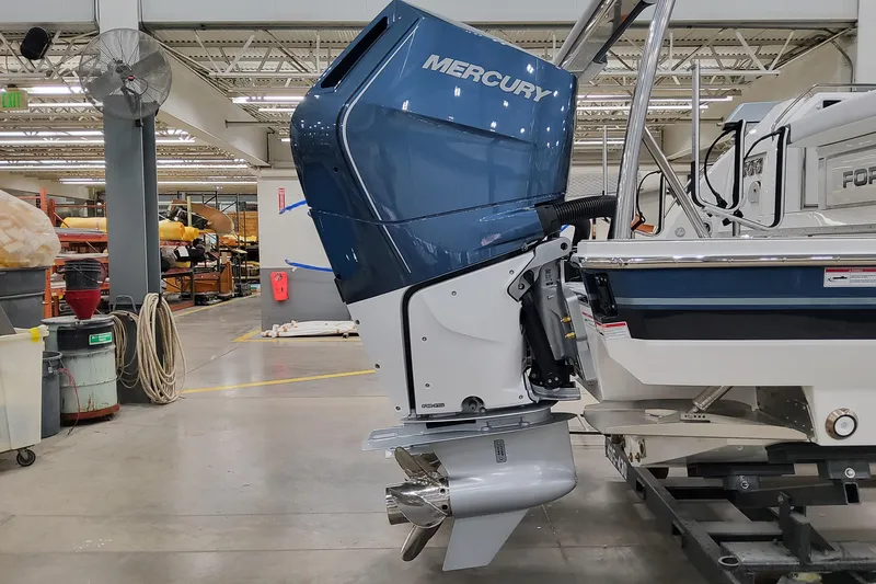  Yacht Photos Pics 2026 Formula 400 Super Sport Crossover with Mercury outboard engine in a workshop.