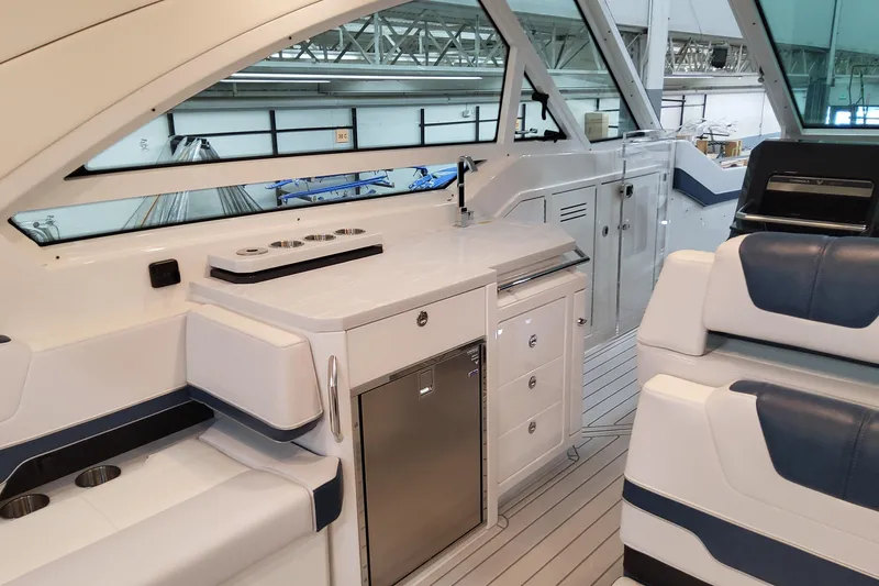  Yacht Photos Pics 2026 Formula 400 Super Sport Crossover interior with sleek seating and modern kitchenette.