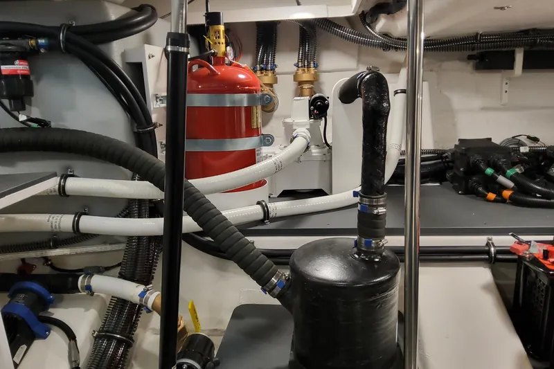  Yacht Photos Pics Engine room of 2026 Formula 400 Super Sport Crossover with hoses and equipment.