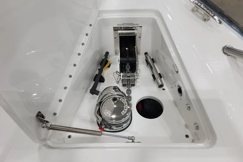  Yacht Photos Pics Anchor compartment of 2026 Formula 400 Super Sport Crossover boat, featuring winch and chain.