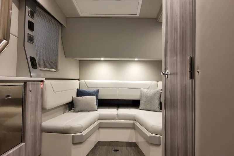  Yacht Photos Pics Luxurious interior of 2026 Formula 400 Super Sport Crossover with modern seating and cushions.