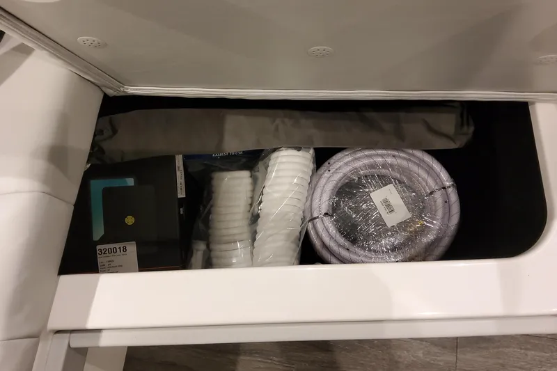  Yacht Photos Pics Storage compartment in 2026 Formula 400 Super Sport Crossover with coiled rope and accessories.