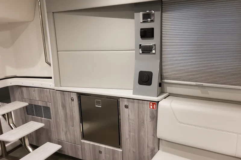  Yacht Photos Pics 2026 Formula 400 Super Sport Crossover interior with modern cabinetry and control panel.