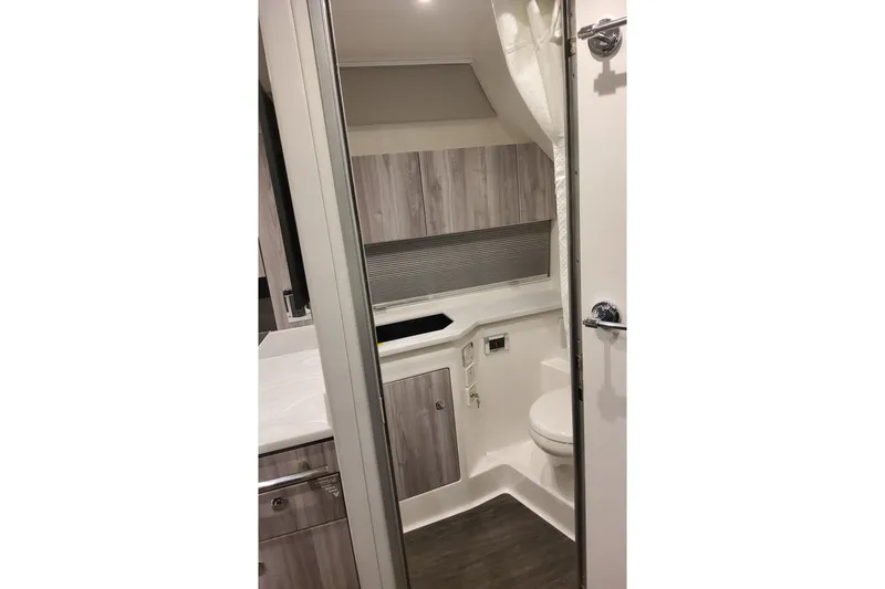  Yacht Photos Pics Interior of 2026 Formula 400 Super Sport Crossover boat bathroom, featuring modern design.