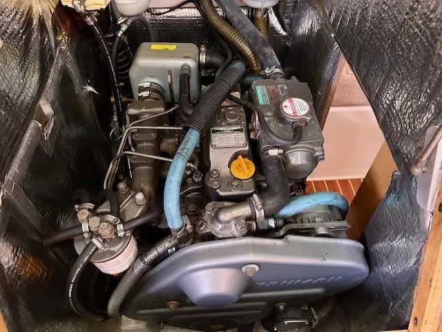 Valanta Yacht Photos Pics Engine compartment of a 2007 Hanse 400 sailboat, showcasing mechanical components and wiring.