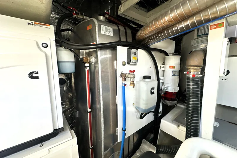 Highland Patriot Yacht Photos Pics Engine room of 2023 Prestige 590 yacht with Cummins equipment and piping.
