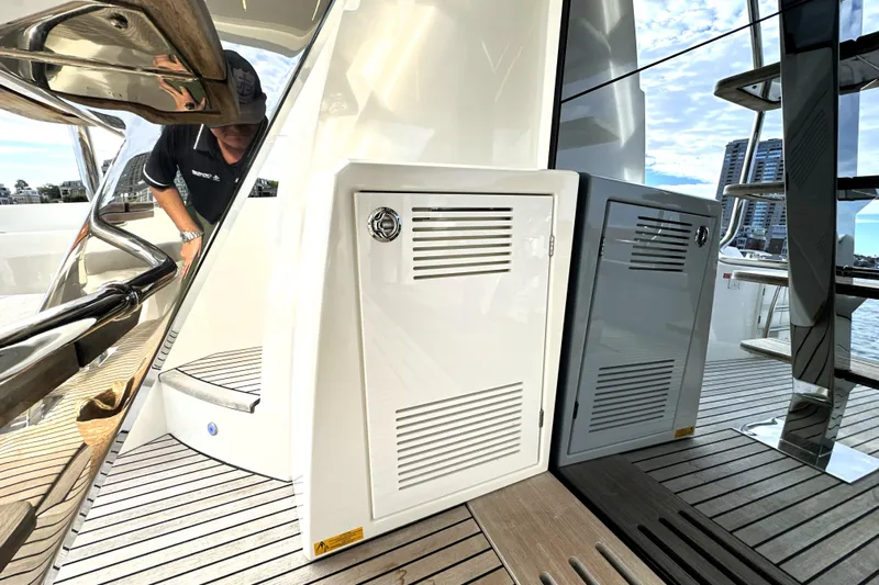 Highland Patriot Yacht Photos Pics 2023 Prestige 590 yacht deck with storage compartments and modern design elements.
