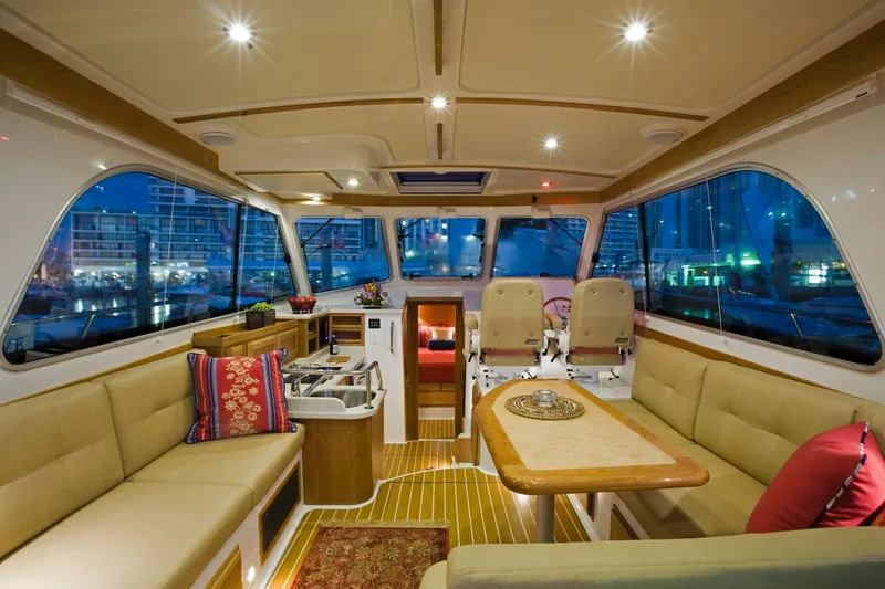  Yacht Photos Pics Luxurious interior of 2026 Back Cove 372 yacht with elegant seating and modern amenities.