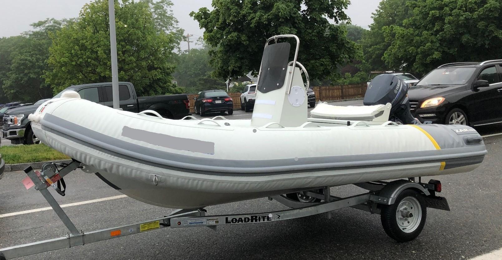 2022 ZAR Mini RIB 14 HDL inflatable boat on a Load Rite trailer.