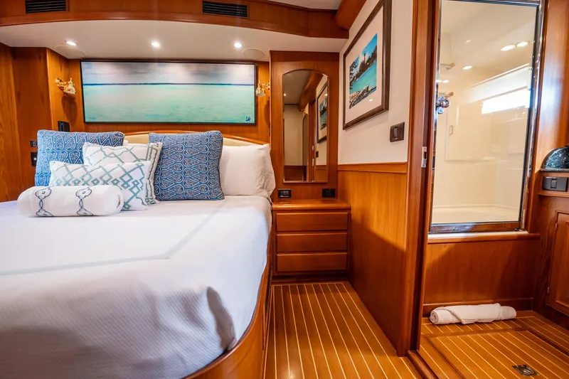 Beba Yacht Photos Pics Luxurious cabin interior of a 2003 Fleming 75 yacht with elegant wood finishes.