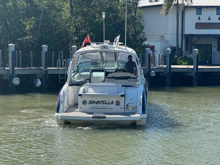 Sonatella Yacht Photos Pics 2017 Formula 400 Super Sport boat docked near a marina.