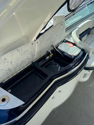 Sonatella Yacht Photos Pics 2017 Formula 400 Super Sport yacht interior with open storage compartment.