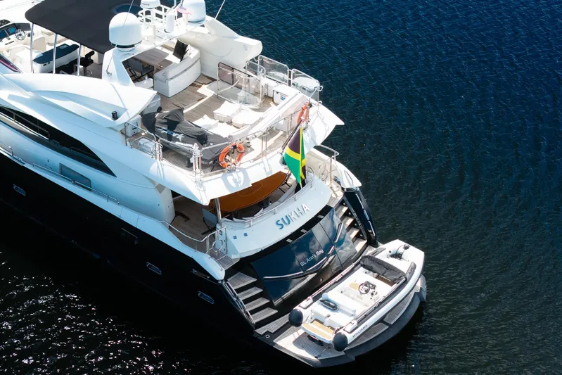 Sukha Yacht Photos Pics Luxury 2008 Sunseeker 90 Yacht on water, aerial view, elegant design.