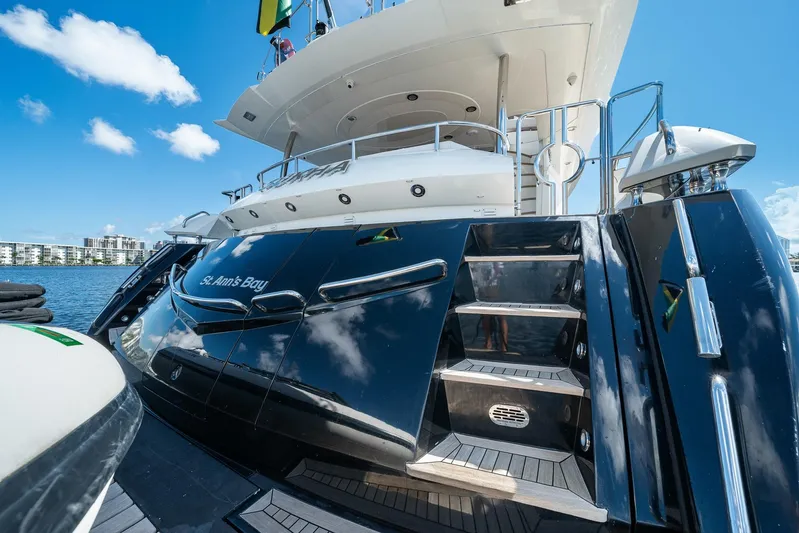 Sukha Yacht Photos Pics Luxury Sunseeker 90 Yacht, 2008 model, docked with sleek black exterior and elegant design.