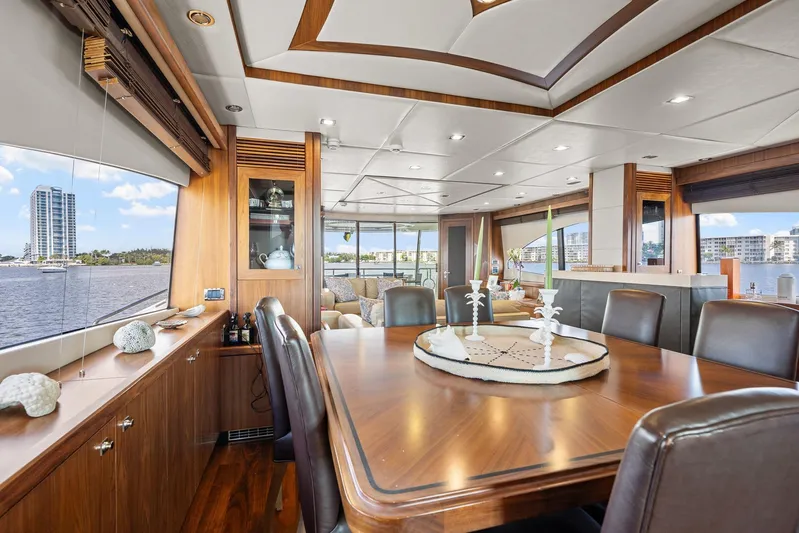 Sukha Yacht Photos Pics Luxurious interior of 2008 Sunseeker 90 Yacht with elegant dining area and waterfront view.