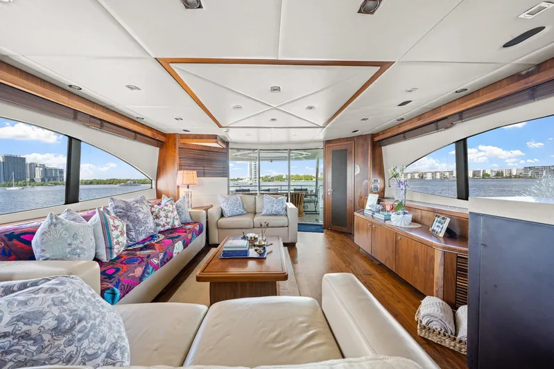 Sukha Yacht Photos Pics Luxurious interior of a 2008 Sunseeker 90 Yacht with elegant furnishings and panoramic windows.