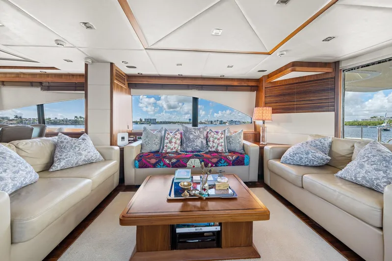 Sukha Yacht Photos Pics Luxurious interior of 2008 Sunseeker 90 Yacht with elegant seating and scenic views.
