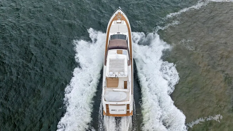 Bon Bon Yacht Photos Pics Aerial view of 2012 Ferretti Yachts 800 cruising on open water.