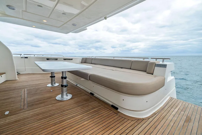 Bon Bon Yacht Photos Pics Luxurious 2012 Ferretti Yachts 800 deck with seating and ocean view.