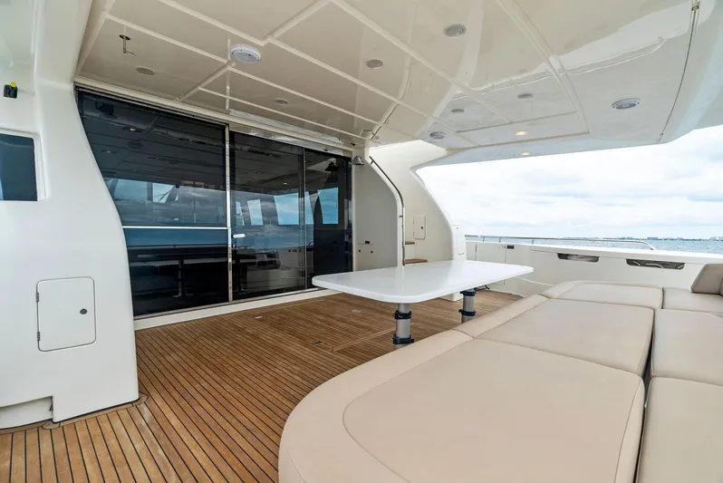 Bon Bon Yacht Photos Pics Luxurious 2012 Ferretti Yachts 800 deck with elegant seating and ocean view.