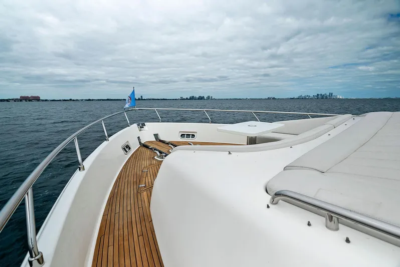 Bon Bon Yacht Photos Pics Ferretti Yachts 800, 2012 model, cruising on open water with wooden deck and sleek design.