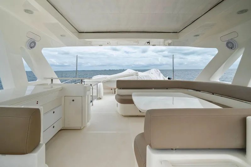 Bon Bon Yacht Photos Pics Luxurious 2012 Ferretti Yachts 800 interior with ocean view and elegant seating area.