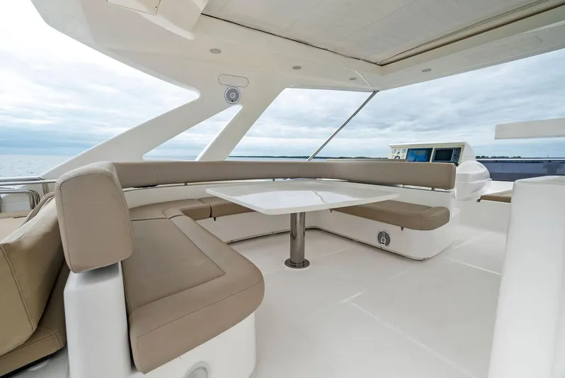 Bon Bon Yacht Photos Pics Luxurious seating area on 2012 Ferretti Yachts 800, featuring elegant design and ocean views.