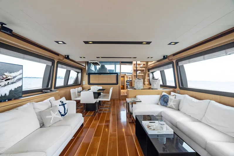 Bon Bon Yacht Photos Pics Luxurious interior of 2012 Ferretti Yachts 800 with elegant seating and wooden flooring.