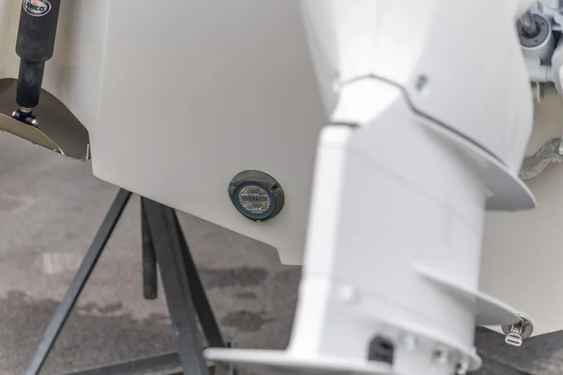  Yacht Photos Pics 2023 Edgewater 248 CX boat detail showing engine and hull components.