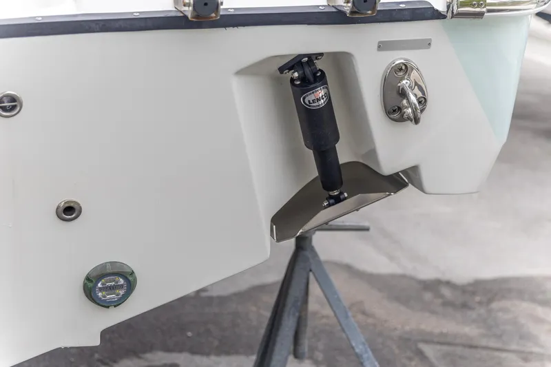  Yacht Photos Pics 2023 Edgewater 248 CX boat transom with trim tab and fittings.