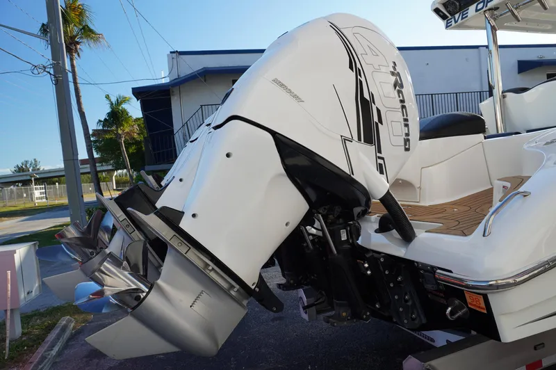  Yacht Photos Pics 2015 MTI 42 XSF boat with Mercury outboard engine, docked outdoors.