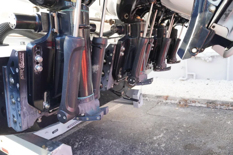  Yacht Photos Pics Close-up of 2015 MTI 42 XSF boat engines and trim tabs.