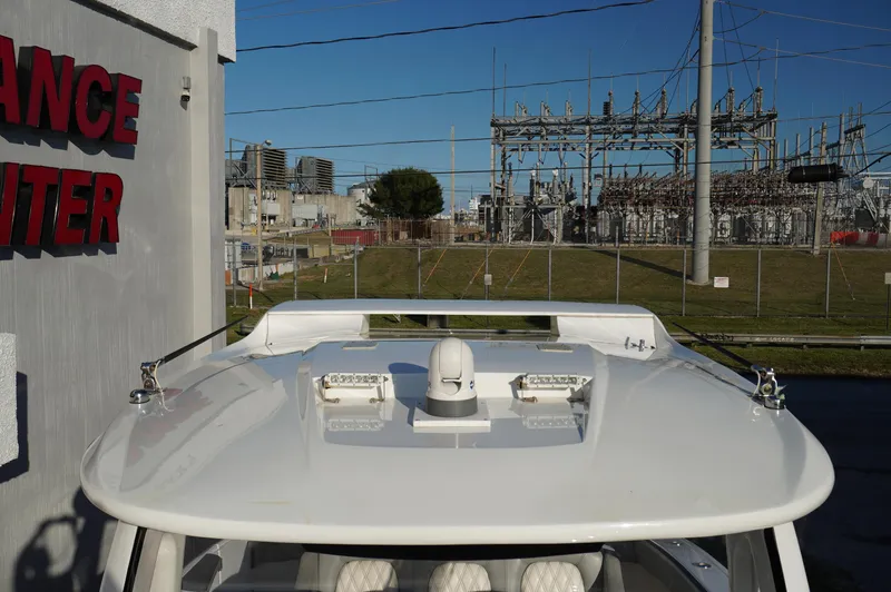  Yacht Photos Pics 2015 MTI 42 XSF boat roof with urban industrial background.