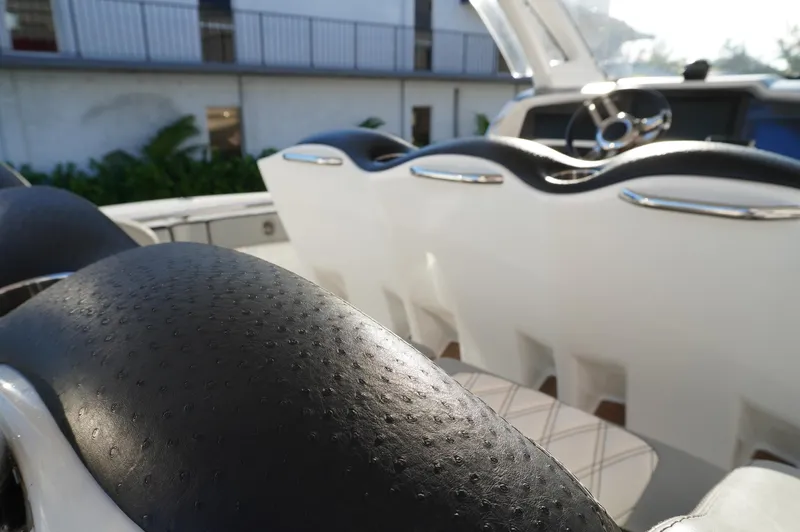  Yacht Photos Pics 2015 MTI 42 XSF boat interior with sleek seating and modern design.