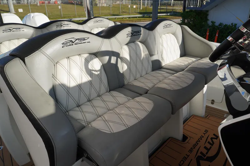  Yacht Photos Pics 2015 MTI 42 XSF boat interior with luxurious seating and elegant design.