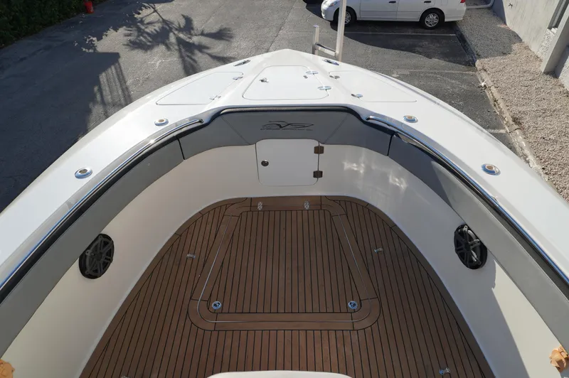  Yacht Photos Pics 2015 MTI 42 XSF boat deck with wood finish and sleek design.
