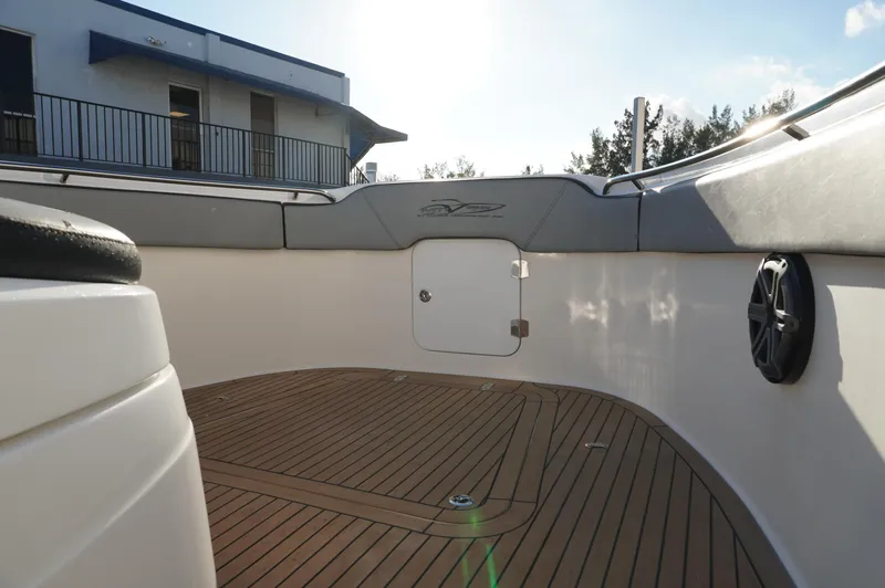  Yacht Photos Pics 2015 MTI 42 XSF boat interior with wooden deck and seating.