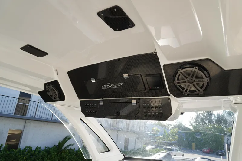  Yacht Photos Pics 2015 MTI 42 XSF boat interior with speakers and control panel.