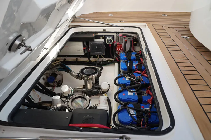  Yacht Photos Pics 2015 MTI 42 XSF boat engine compartment with batteries and wiring.