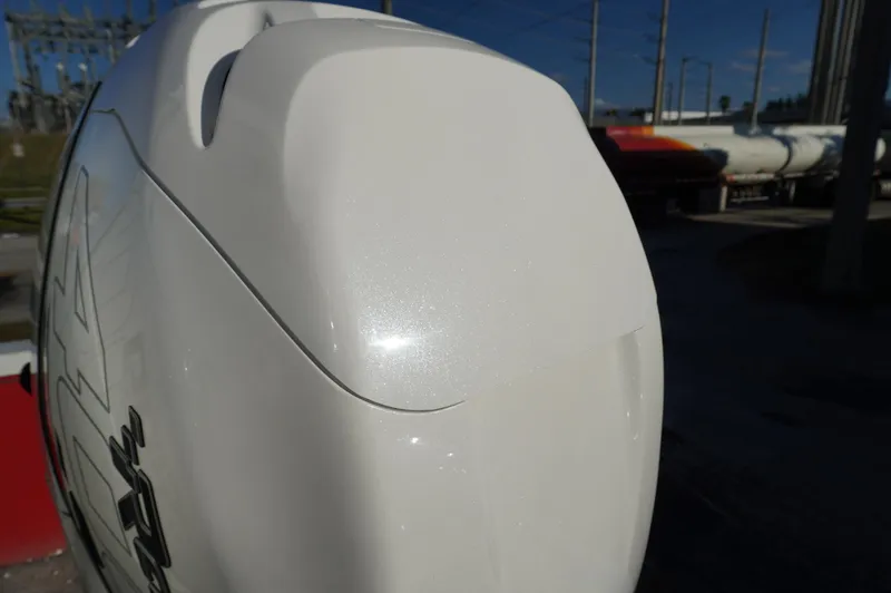  Yacht Photos Pics Close-up of a 2015 MTI 42 XSF boat engine cover in sunlight.