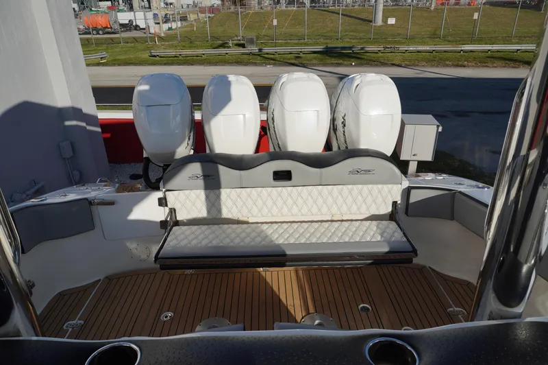  Yacht Photos Pics 2015 MTI 42 XSF boat with four powerful outboard engines and cushioned seating.