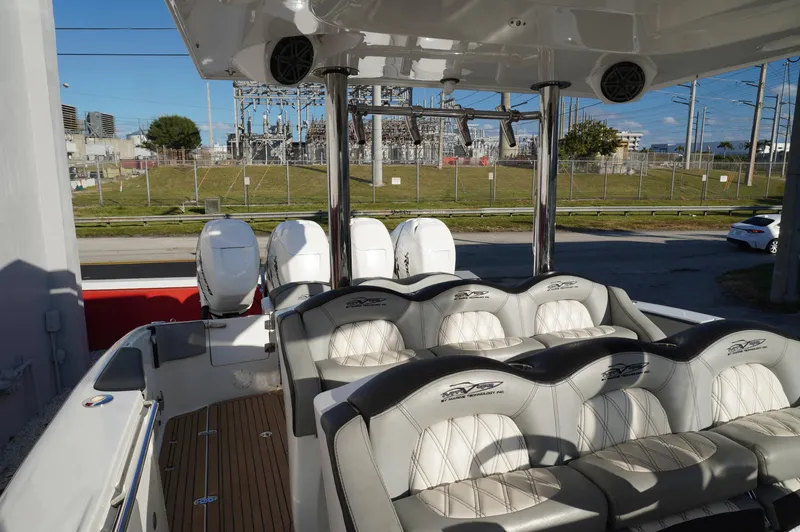  Yacht Photos Pics 2015 MTI 42 XSF boat interior with luxury seating and powerful outboard engines.