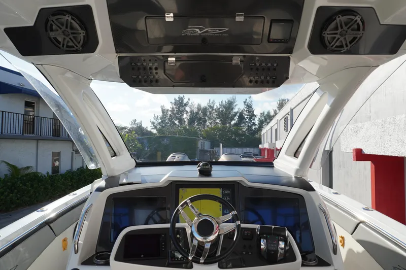  Yacht Photos Pics 2015 MTI 42 XSF boat cockpit with modern steering and navigation system.