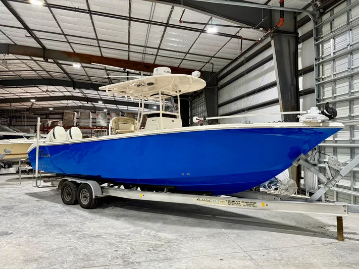  Yacht Photos Pics 2020 Sea Chaser 30 HFC CC boat in a warehouse on a trailer.