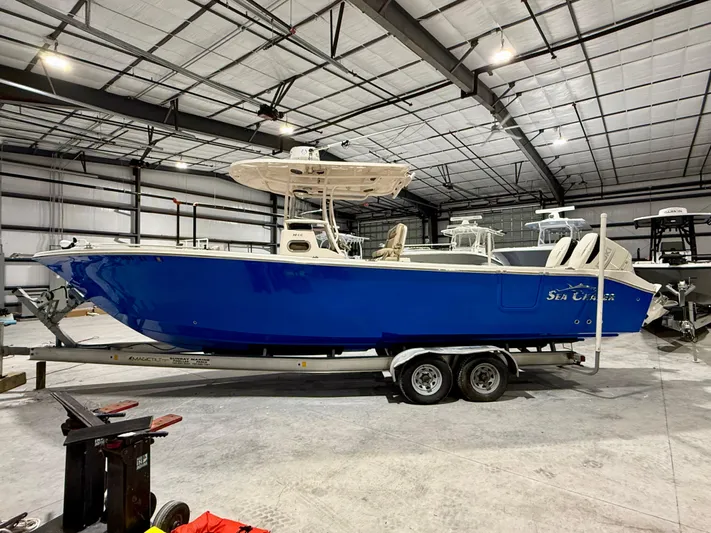  Yacht Photos Pics 2020 Sea Chaser 30 HFC CC boat in a warehouse, on a trailer.