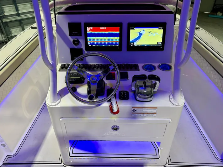  Yacht Photos Pics 2020 Sea Chaser 30 HFC CC boat console with dual screens and illuminated controls.