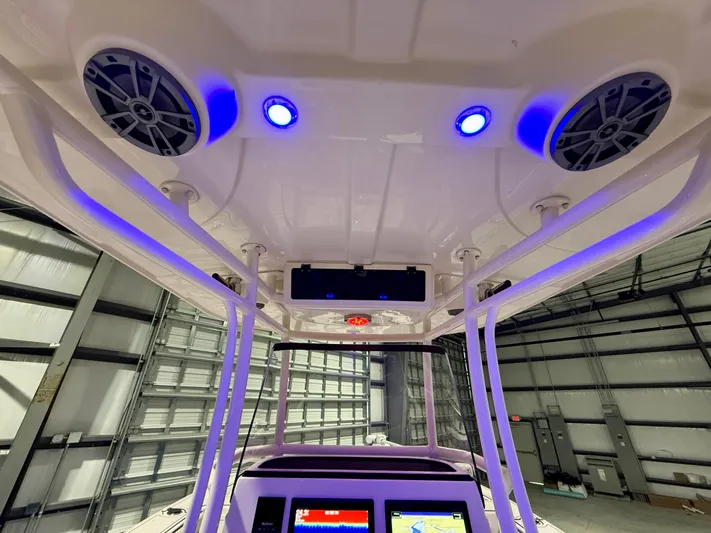  Yacht Photos Pics 2020 Sea Chaser 30 HFC CC boat interior with blue LED lights and speakers.
