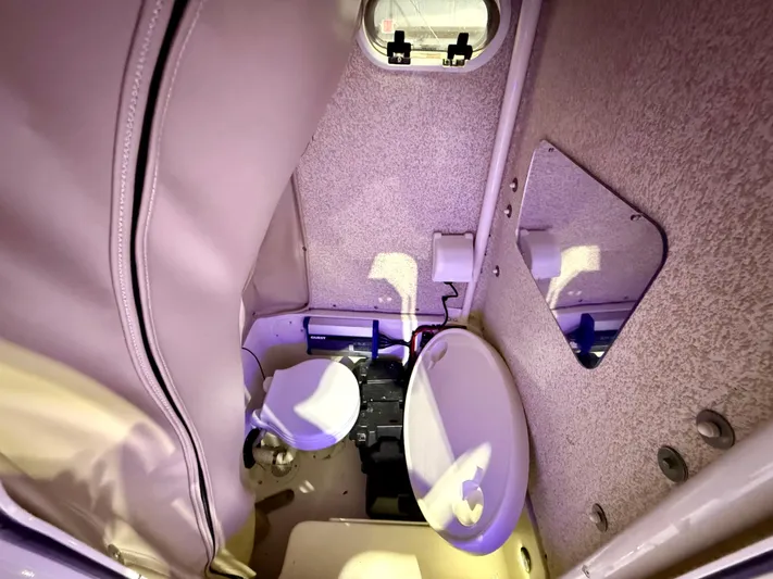  Yacht Photos Pics 2020 Sea Chaser 30 HFC CC boat interior with compact bathroom amenities.