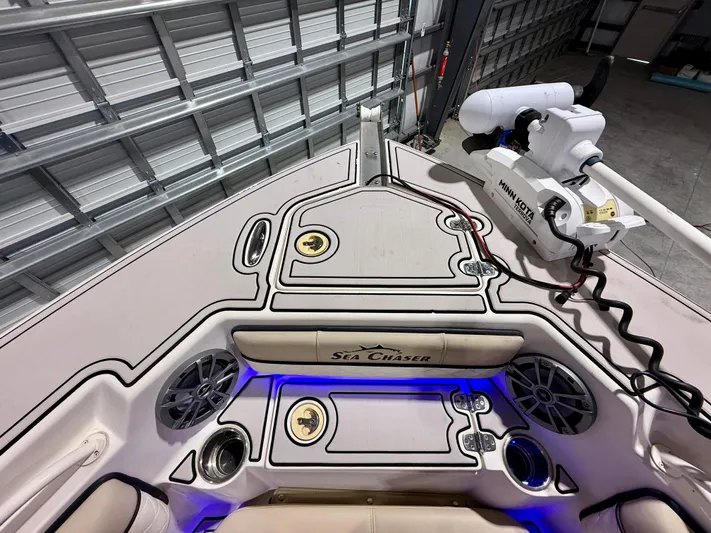  Yacht Photos Pics 2020 Sea Chaser 30 HFC CC boat deck with advanced fishing equipment and blue LED lighting.