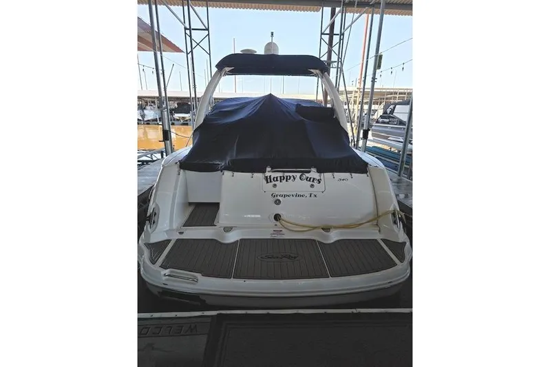  Yacht Photos Pics 2007 Sea Ray 340 Sundancer docked, covered, with "Happy Ours" name visible.